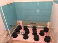 Adjustable feet / pedestals for shower tray