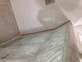 Custom-made shower tray with cut-outs and atypical shapes - ARCHITECT