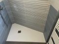 Custom-made shower tray with cut-outs and atypical shapes - ARCHITECT